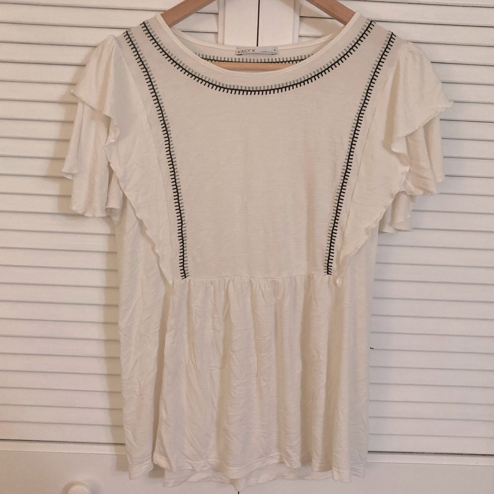 White shirt with black embroidery